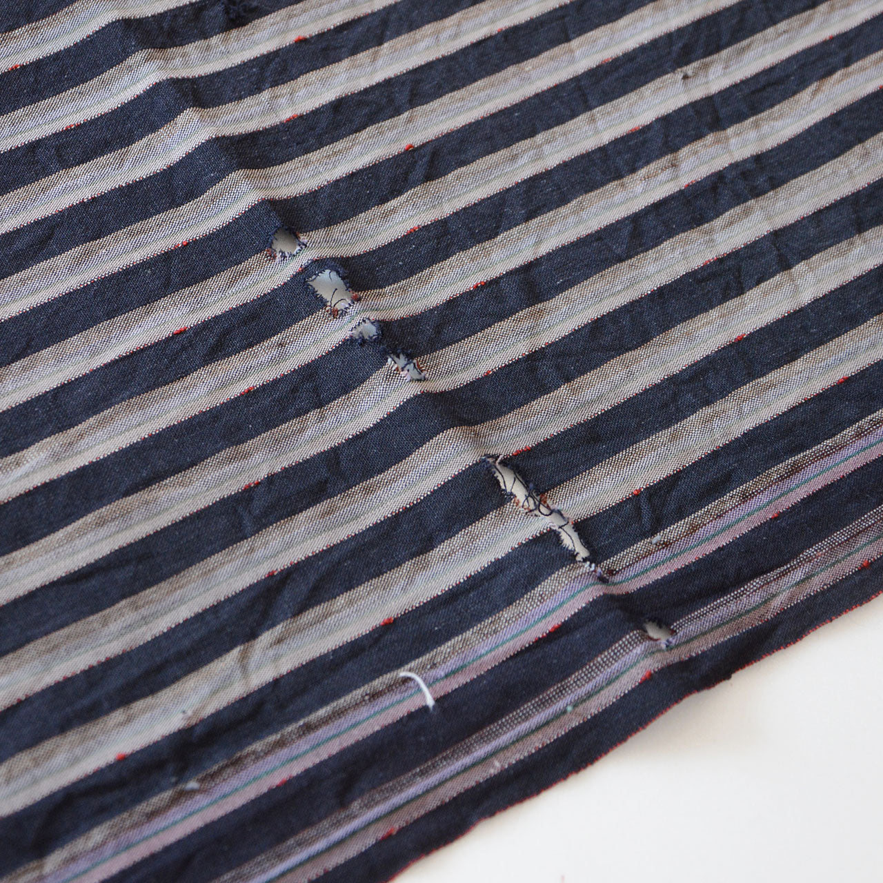 Japanese vintage cotton fabric used as futon cover, beautifully aged over time