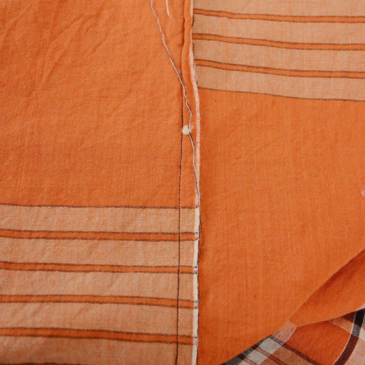 Orange plaid futon cover textile used in Japanese homes of the 1950s