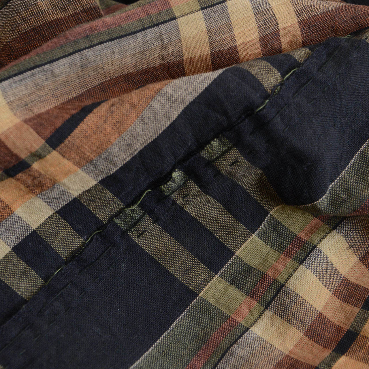 Hand-stitched black-check Boro fabric suitable for sewing or display.