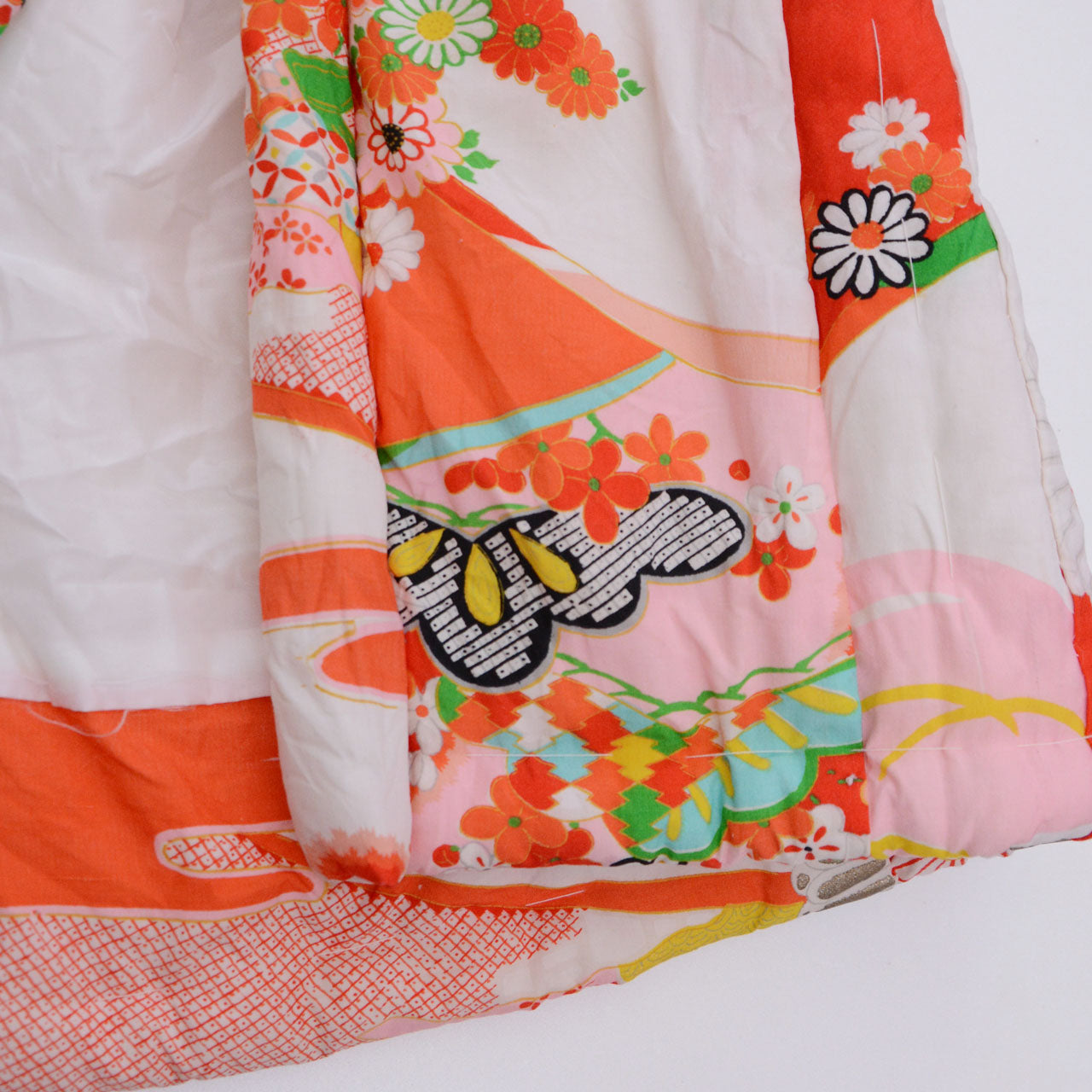 Vintage Japanese kids' sleeveless hanten, cotton with auspicious motifs, padded body, vermillion red base, Showa era