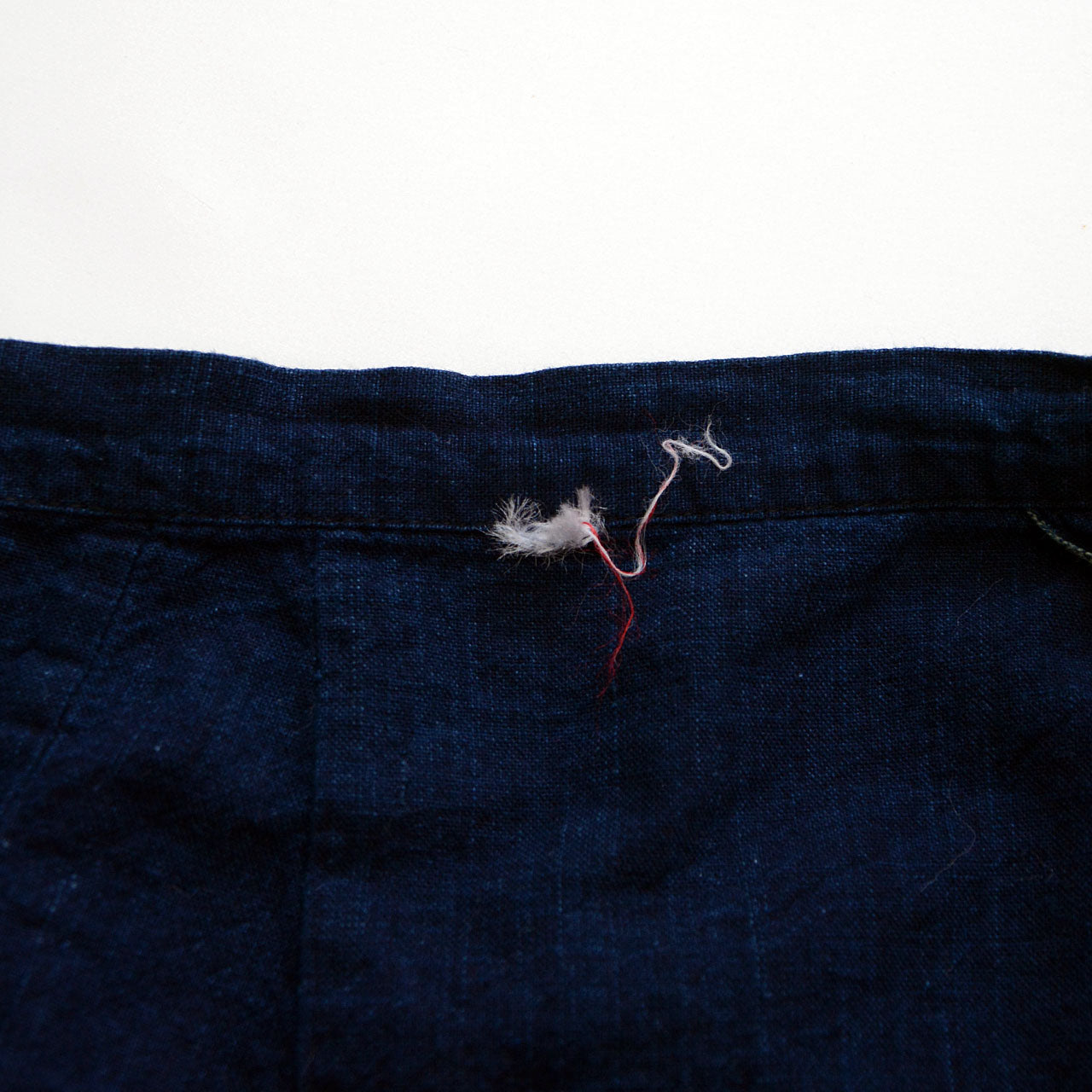 Soft, faded indigo momohiki with natural texture and age patina