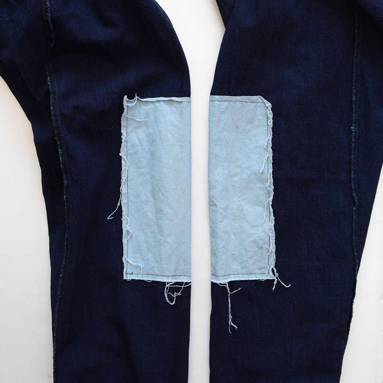 Indigo-dyed Japanese trousers styled for modern casual wear