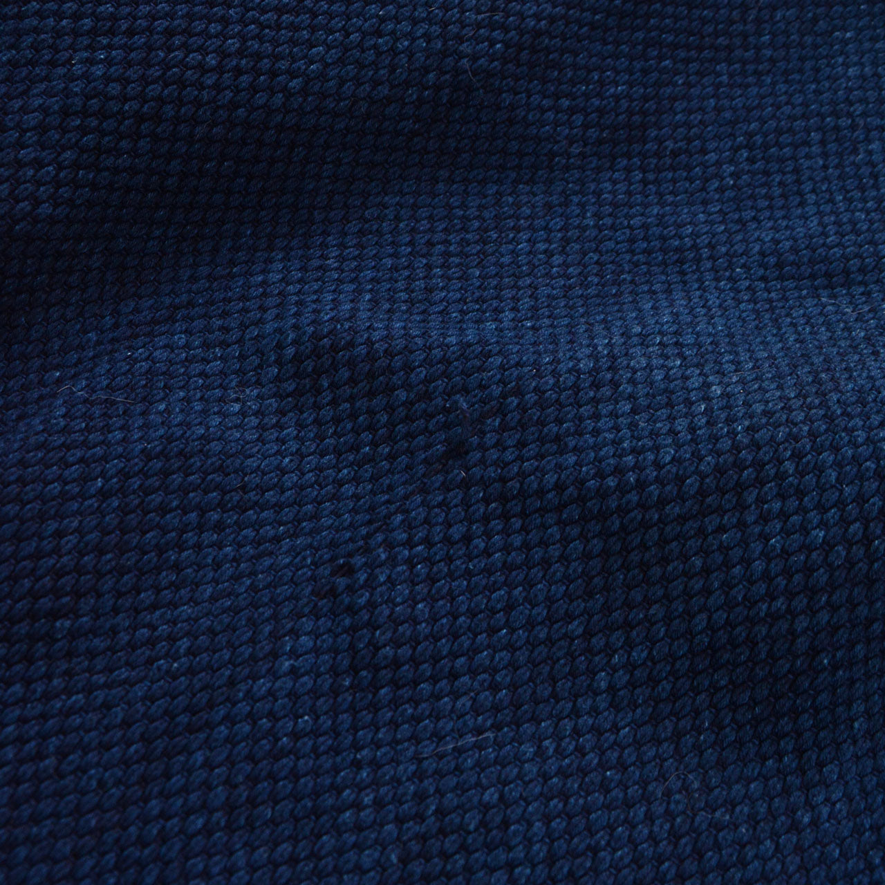 Indigo-dyed Japanese kendo gi with gold kanji embroidery, Bushu Ichi, late Heisei period