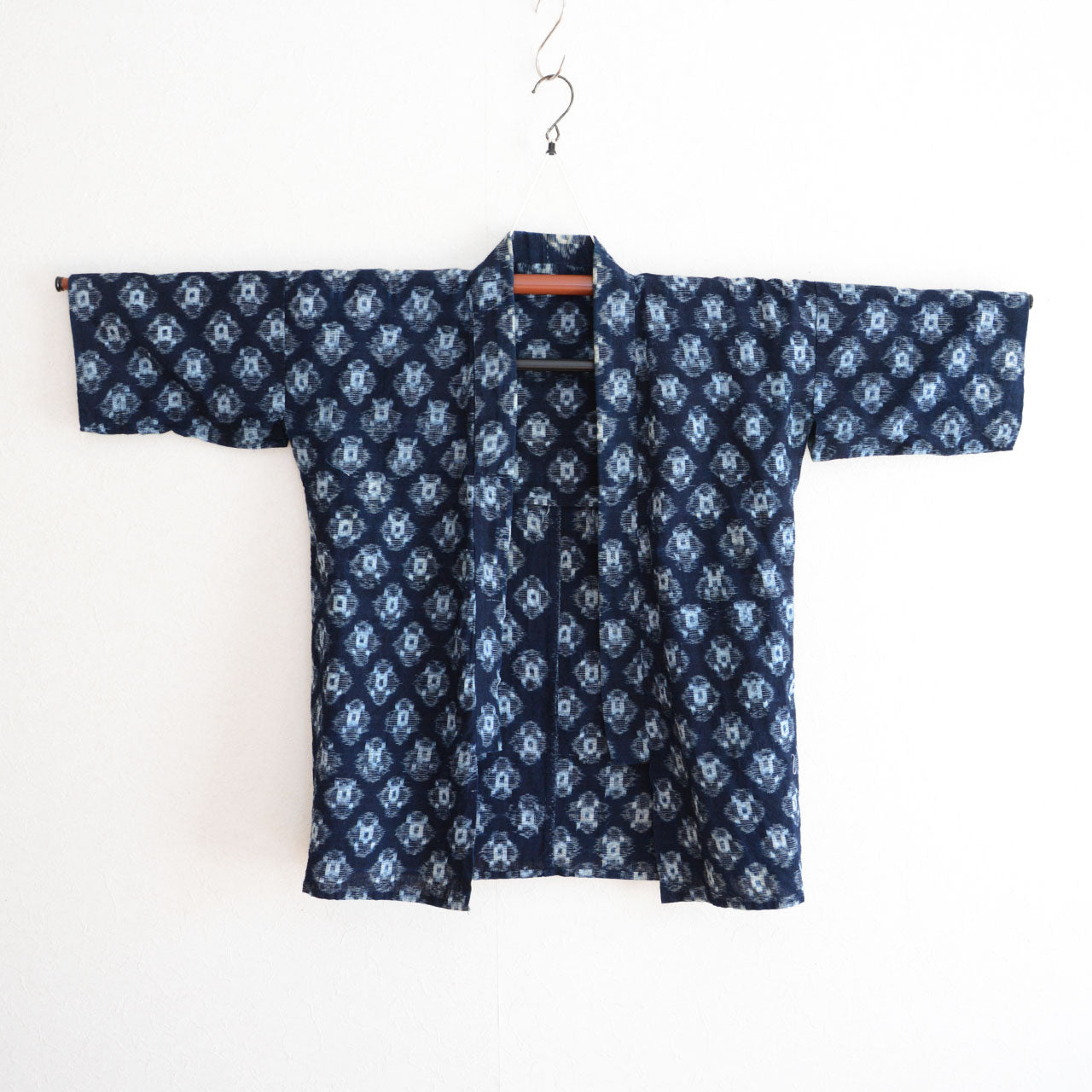 Traditional Japanese cotton work jacket showing natural aging