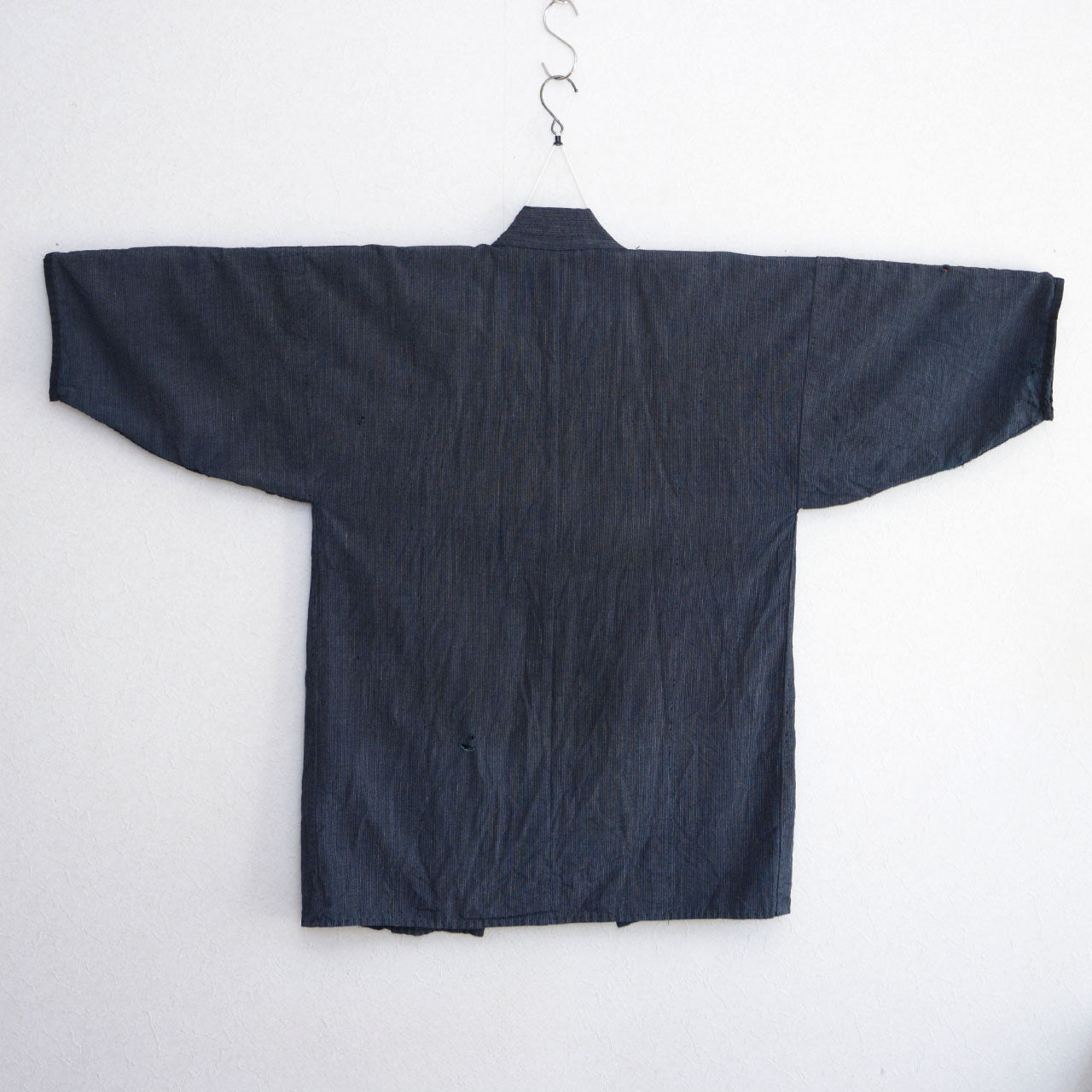 Indigo dyed Noragi jacket with natural wear and texture