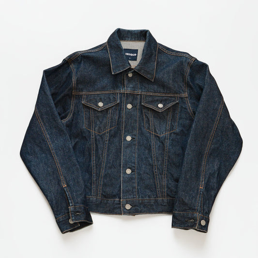 Vintage UNIQLO dark indigo cotton denim trucker jacket with flapped chest pockets
