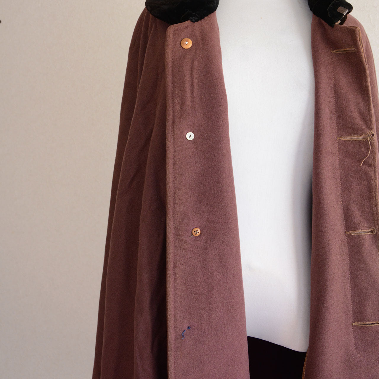 Vintage Japanese wool cape showing natural wear and aging